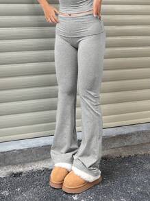 Pantaloni casual da donna a vita larga e zampa d'elefante di colore unito, leggings a vita alta con vita arricciata e vestibilità slim