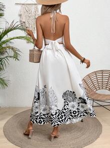 Breezaya Conjunto de 2 piezas de estilo vacacional con top tipo halter estampado con flores y plantas y falda con abertura lateral envuelta - Blanco y Negro - Ver 5