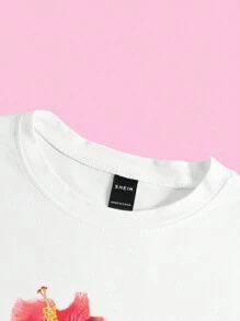 Flirla Camiseta de mujer talla grande de manga corta de verano con estampado de flores de hibisco, blusas gráficas para mujer