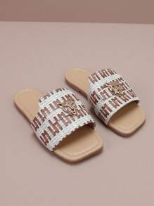 Sandales plates pour enfants avec boucle décorée d'une tête de léopard