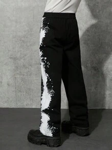 Manfinity Denimwave Men's Personalised Black Denim Pants, Wide Leg Cut, Unique Ink Splatter Print, Y2K Streatwear Fashion, Crafted For Street Style Aficionados Seeking Bold And Artistic Looks.