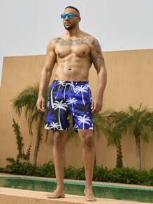 Manfinity Heren grote maten vakantie casual strandshorts met kleurblokken en kokospalmprint