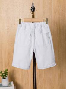 Shorts de mezclilla holgados y desgastados para niño joven en verano