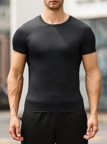 Camiseta deportiva de compresión de manga corta de color liso, estilo boyfriend para hombres