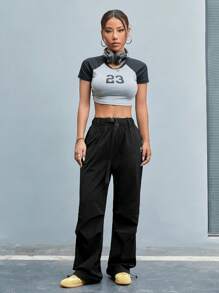 SHEIN Sports Pantalones deportivos rectos para mujer con cinturón y bolsillos en unicolor