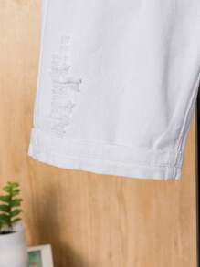Shorts de mezclilla holgados y desgastados para niño joven en verano