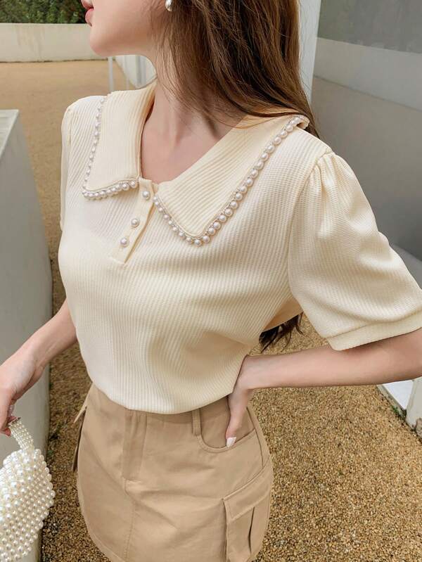 DAZY Camiseta de manga corta con cuello Peter Pan, decorada con perlas de imitación en unicolor de verano casual para mujer