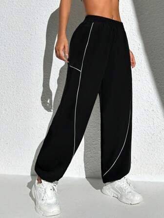 Exploreva Randiga sportbyxor med färgblock på sidan med fickor för utomhusaktiviteter