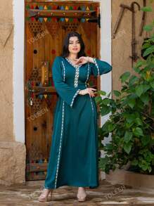 Vestido largo de mangas largas árabe de moda y elegante para mujer