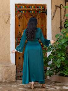 Vestido largo de mangas largas árabe de moda y elegante para mujer