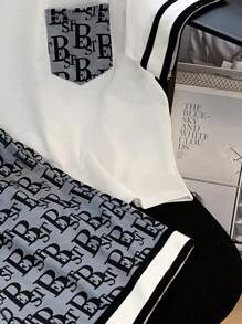 SHEIN Young Boy Casual Printed Pocket Round Neckline Short Sleeve T-Shirt And Printed Shorts Knitted Two-Piece Set With Woven Belt