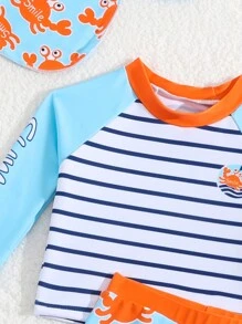 Traje de baño para bebé niño con top estampado y Bottom estampado aleatorio + gorro de natación - Azul Marino - Ver 3