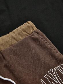 Manfinity VCAY 宽松男士字母图案抽绳腰短裤