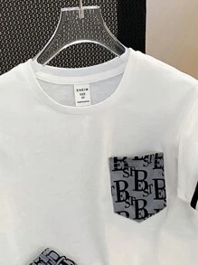 SHEIN Young Boy Casual Printed Pocket Round Neckline Short Sleeve T-Shirt And Printed Shorts Knitted Two-Piece Set With Woven Belt