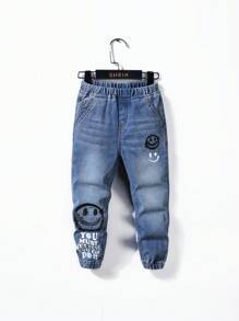 SHEIN Young Boy Street Fashionable Face Emoji Alphabet Doodle Printing Elastic Elastic Waist Binding Leg Baggy Jeans For Summer Vacation And Dailywear - Blue - View 1