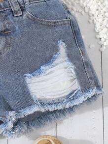 Young Girl Fashionable Distressed Frayed Denim Shorts