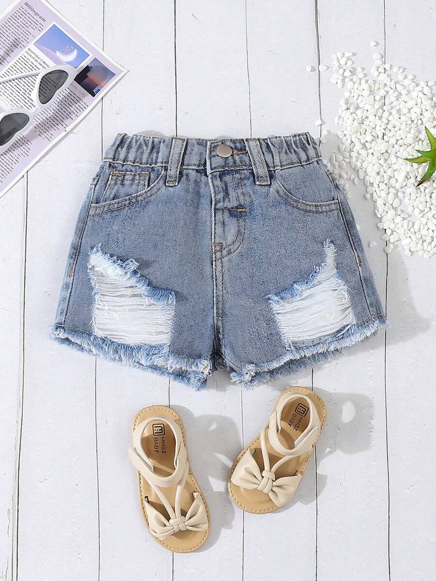 Young Girl Fashionable Distressed Frayed Denim Shorts