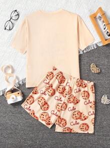 SHEIN Conjunto de pijama de verano para niña preadolescente resistente a las llamas, transpirable y cómodo, con mangas cortas y pantalones cortos.