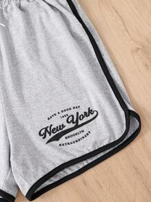 SHEIN Casuvi Kids 少女圓領短袖連帽上衣與運動短褲套裝