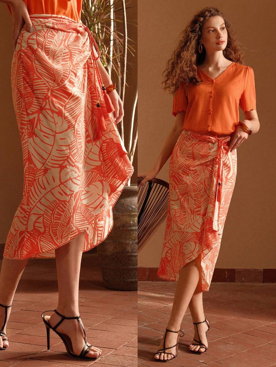 MOTF PREMIUM 熱帶印花不對稱下擺披風裙