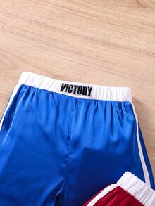 SHEIN Conjunto de 2 piezas de pantalones cortos deportivos de boxeo para niños jóvenes de moda urbana - Multicolor - Ver 3