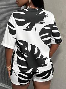 Slaydiva Conjunto de blusa holgada y pantalones cortos con estampado tropical de plantas para mujer, con estilo sexy/informal. Incluye pantalones cortos de cintura alta apropiados para playa, estilo bohemio, festivales, salidas, etc.