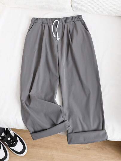 SHEIN Tween Boys' Extended Size Casual Solid Color Slant Pockets Straight-Leg Baggy Woven Pants