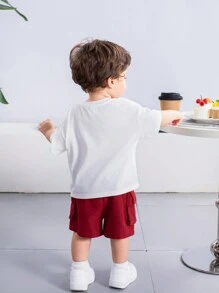 SHEIN Baby Boy Or Baby Girl Cartoon Animal Pattern Soft Knit Round Neck Short Sleeve Top And Solid Color Shorts 2pcs/Set