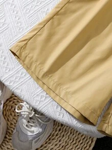 Teen Boy Color-Block Short Sleeve Top And Solid Color Shorts 2pcs Outfit