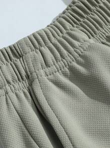 Conjunto de camiseta sin mangas y pantalones cortos sencillos y diarios para hombre