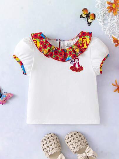 The Wizard of Oz X SHEIN Camiseta de manga abullonada con ribete de volantes para niña con bloqueo de color floral y gráfico de figura