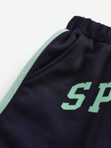 SHEIN Young Boy Knitted Color Block Letter Printed Elastic-Waist Sports Shorts With Pockets