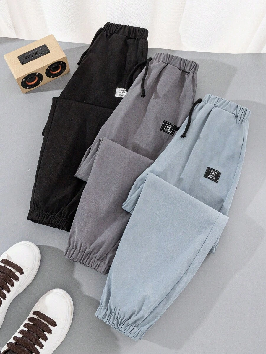 SHEIN 3入組青少年男孩鬆身休閒純色束口運動長褲套裝 - 彩色 - 查看 1