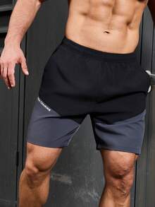 SHEIN Shorts Esportiva Masculina de Cintura Elástica com Blocos de Cor e Bolsos, Estilo Namorado, para o Verão - Preto - Visão 4