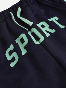 SHEIN Young Boy Knitted Color Block Letter Printed Elastic-Waist Sports Shorts With Pockets