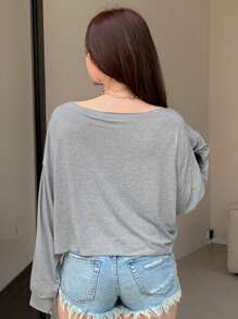 Dazy Petite Plus Camiseta de manga larga casual y holgada para mujer de talla grande con cuello asimétrico de unicolor para primavera/verano