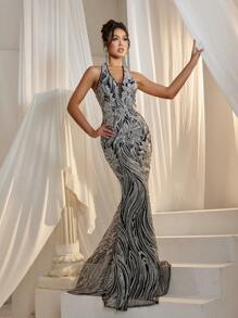 Faeriesty 永恒经典的露背无袖美人鱼晚礼服，饰以精致艺术刺绣——勾勒出曼妙的美人鱼轮廓，搭配曳地长裙摆和奢华装饰，是红毯、盛大晚宴、婚礼和奢华派对的完美之选，也适合婚宴、化装舞会、神秘花园派对、正式晚宴、黑领结活动、毕业典礼和生日等场合。优雅的春夏装扮，尽显女性魅力。 - 銀色 - 查看 1