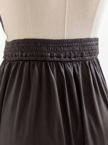 Soleia Women's Solid Color Halter Backless Dress With Swirling Hemline, Perfect For Spring/Summer Holidays - Black - View 5