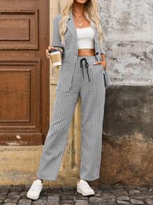 SHEIN LUNE Conjunto de blazer e calça alfaiataria de trabalho de estampa única para mulher (floral assimétrico) - Preto e Branco - Visão 6