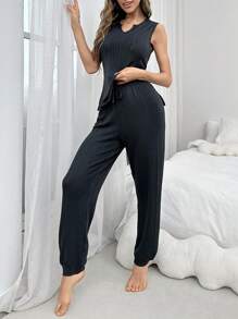 Set aus einer Weste mit Einfarbig und Cut Out-Ausschnitt Rücken Design und einer Hose mit weitem Bein