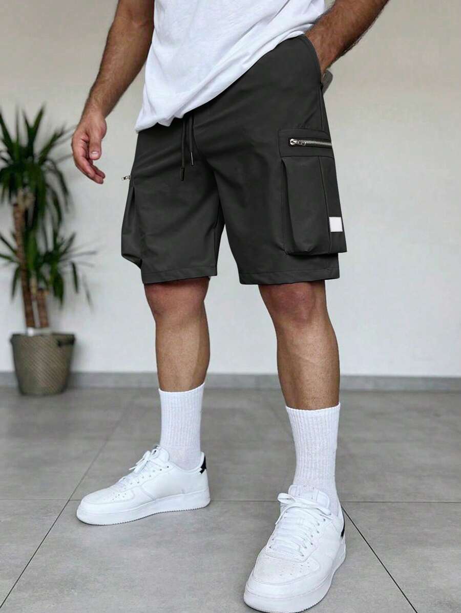 Manfinity Homme Quần short nam màu trơn đơn giản có túi, mặc hàng ngày - màu đen - Xem 1