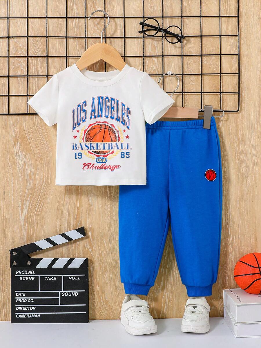 SHEIN Conjunto casual para bebe niño con camiseta estampada en inglés de manga corta y pantalón largo - Azul - Ver 1