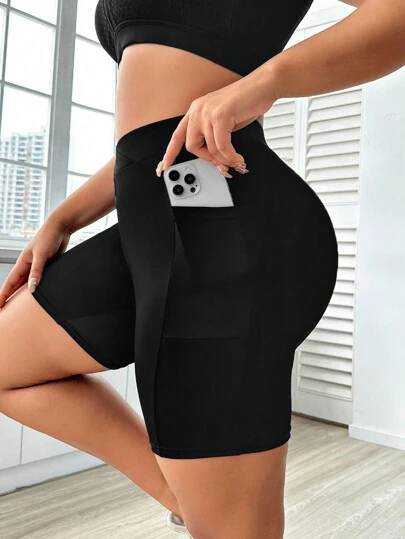 SHEIN Rhythm Era 黑色帶口袋的大尺碼運動短褲