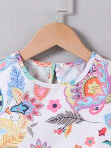 Conjunto de blusa sin mangas con estampado floral y pantalones de pierna ancha para niña joven con adornos de borlas para vacaciones