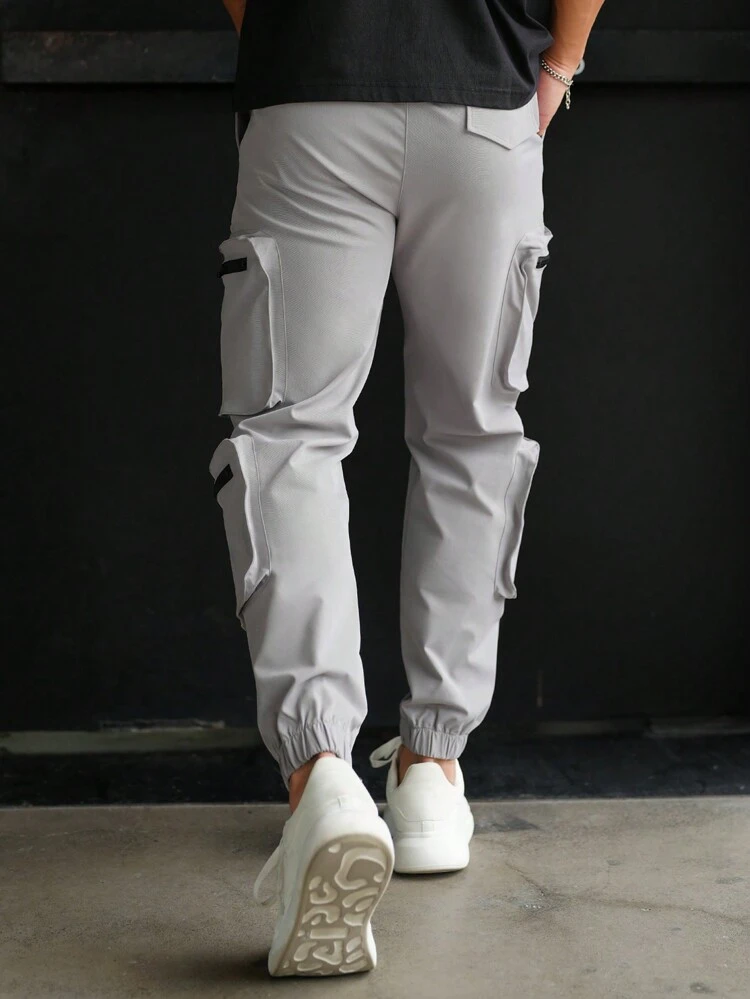Men's Solid Color Drawstring Waist Pants With Pockets And Elastic Cuffs