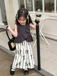 SHEIN Conjunto de top sin mangas con volantes de moda para niña joven y pantalones anchos - Blanco y Negro - Ver 2