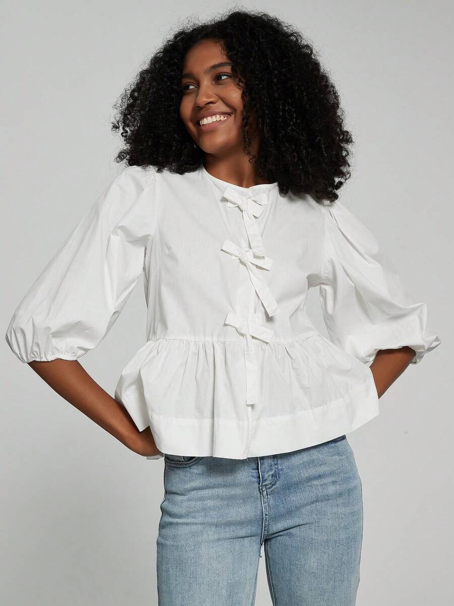 女款白色泡泡袖蝴蝶結扣式襯衫