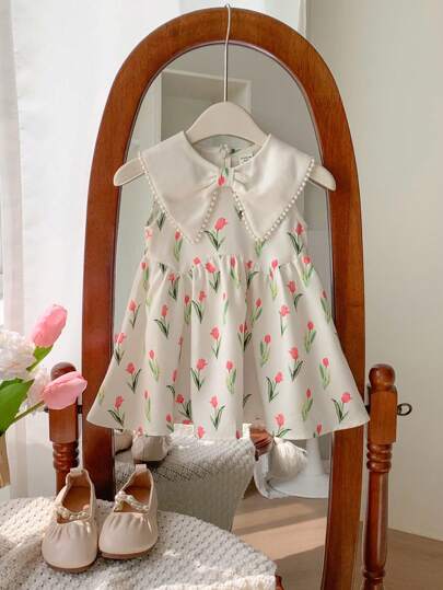 SHEIN LMoss Kids LMoss 女婴可爱女婴珍珠蝴蝶和花朵印花无袖连衣裙，带彼得潘领，非常适合生日派对、一周年庆典、表演、婚礼和其他场合