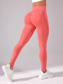 SHEIN Sport Studio Mallas de yoga ajustadas y sólidas para mujer para modelar los glúteos