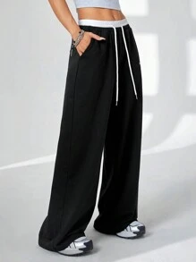 Coolane Women's Solid Color Patchwork Front Tie Pocket Casual Pants, For Daily Wear - Black and White - View 3